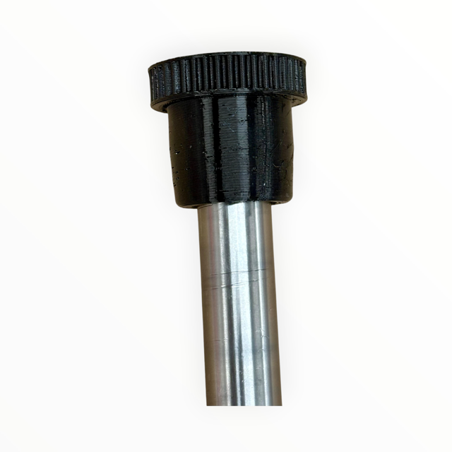 Black TPU hood stand lift arm cap fitted over a metal lift arm, showing the wide protective pad.

