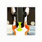 Front close-up of the M-Lifter Tab Trap surrounding a green pulling tab beneath the puller shaft.