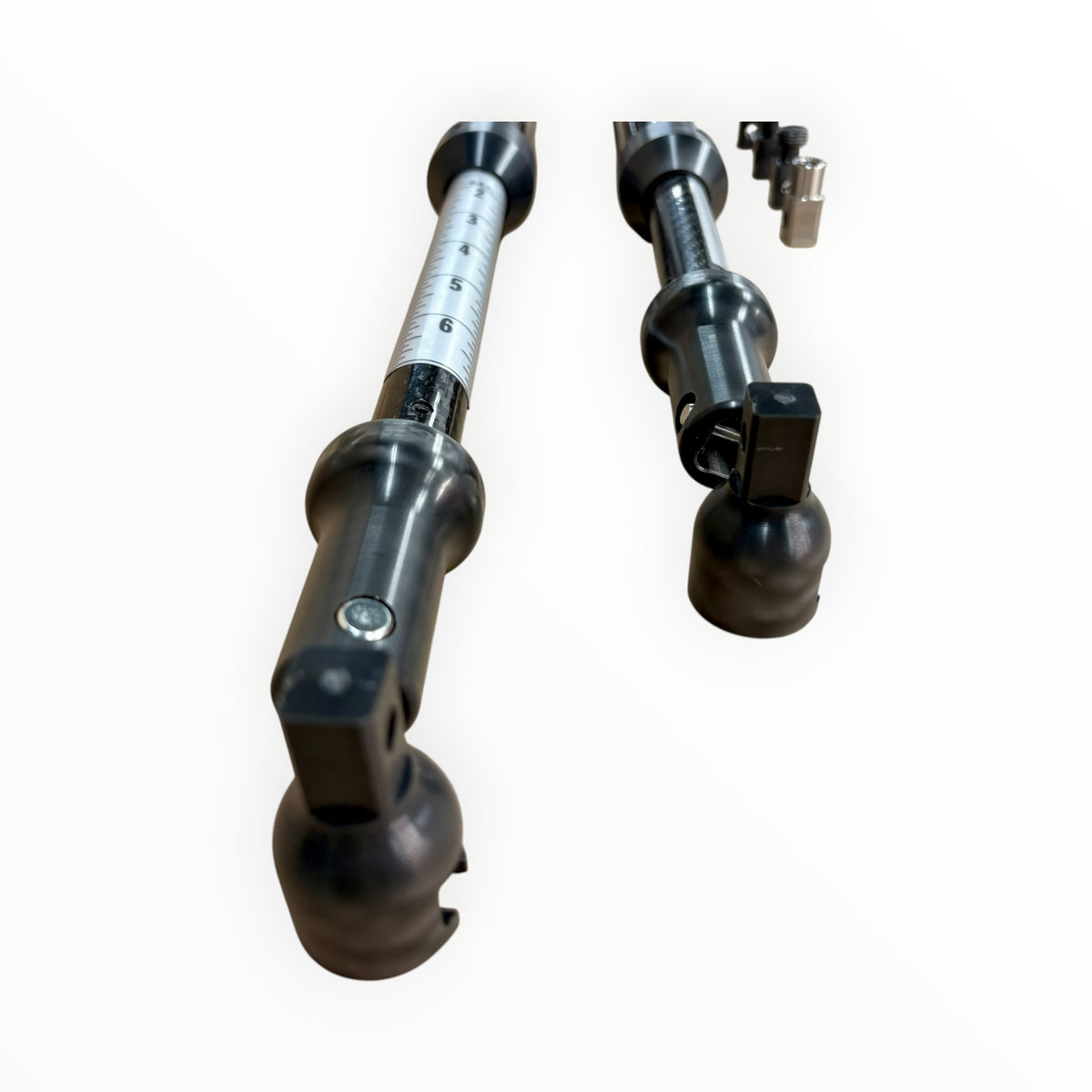 Rail-Rifle and Rail-Pistol slide hammer shafts showing power scales and square drive tab connections.