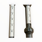Close-up of numbered power scales on Rail-Rifle and Rail-Pistol slide hammer shafts.