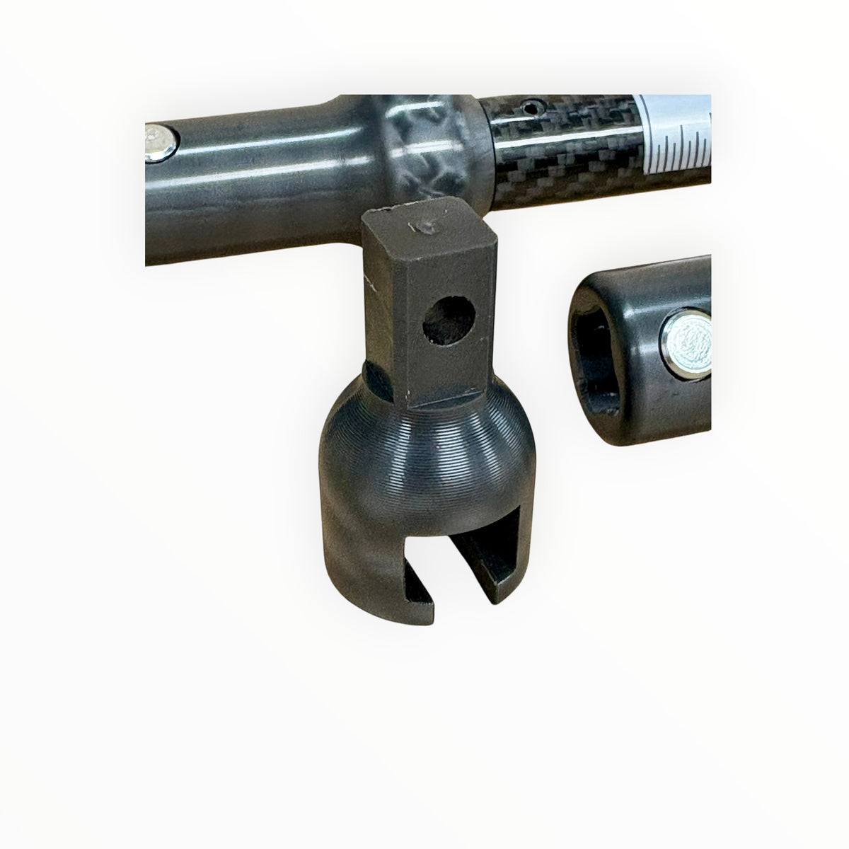 Rail-Gun square drive tab adapter beside slide hammer connection sockets.